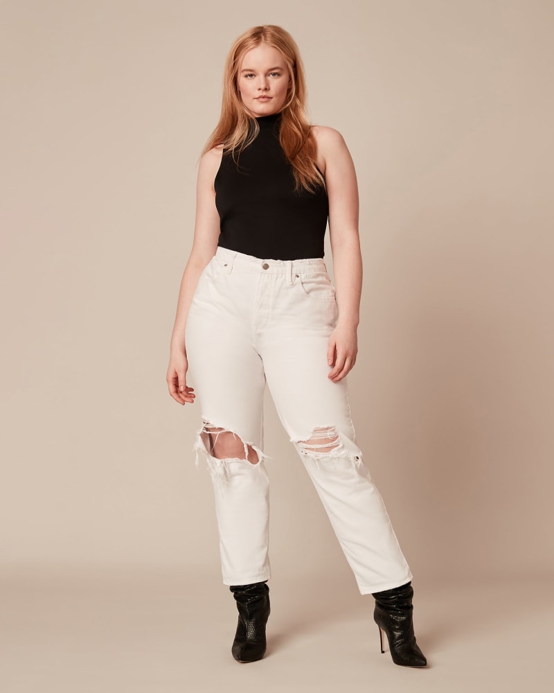Front of a model wearing a size 14 Good '90s Duster Natural Fray in WHITE by Good American. | dia_product_style_image_id:225620